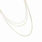 Collier triple doré Annick chaînes miroir - Bijou photographié sur fond blanc