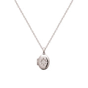 Médaillon ouvrant Elvira argent ovale avec étoile polaire sertie de zircons - Bijou photographié sur fond blanc