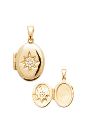 Médaillon ouvrant Elvira doré ovale avec étoile polaire sertie de zircons - Bijou photographié sur fond blanc