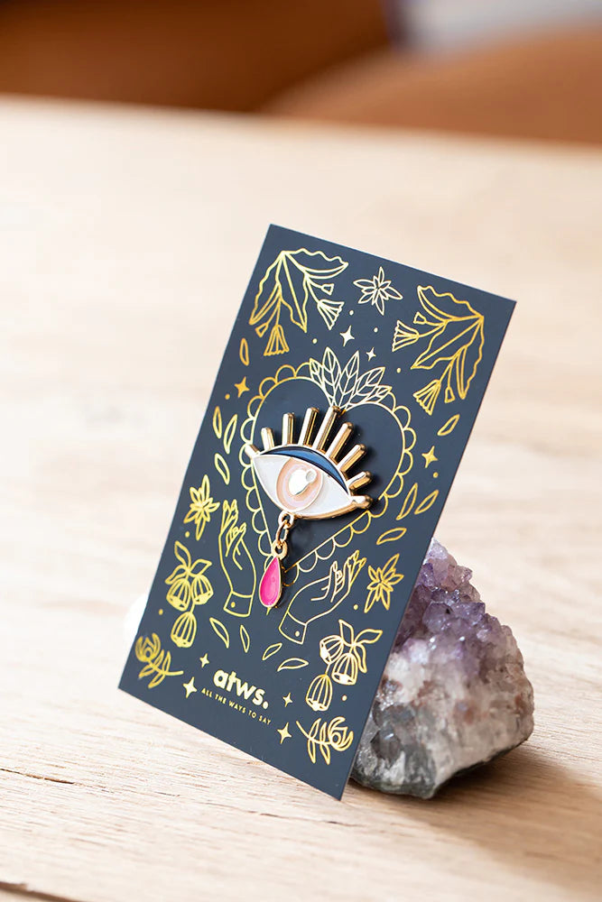Pin's doré œil avec pendentif goutte - Accessoire